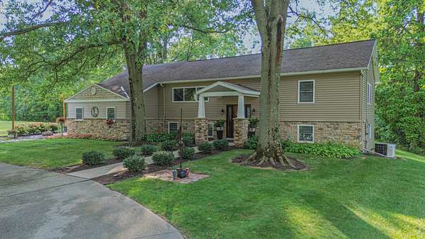 6.77 Acres of Land with Home for Sale in Milan, Ohio