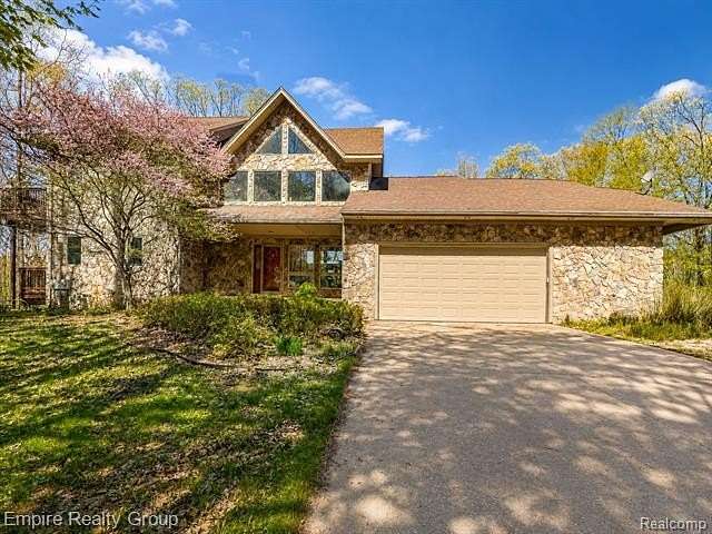 2.66 Acres of Land with Home for Sale in Groveland Township, Michigan