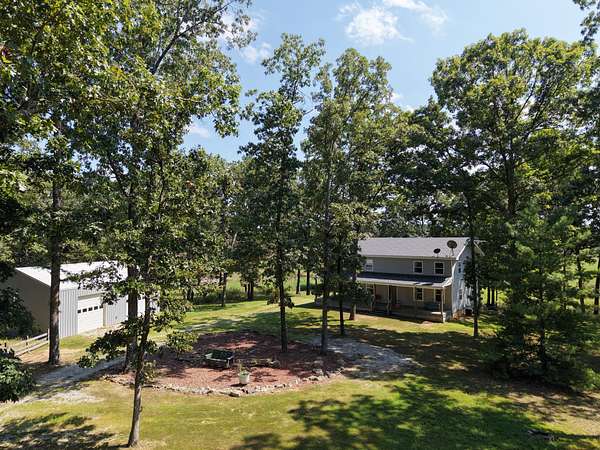 198 Acres of Land with Home for Sale in Mountain View, Missouri
