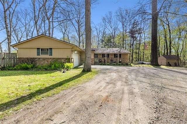 10.6 Acres of Land with Home for Sale in Hartland Township, Michigan