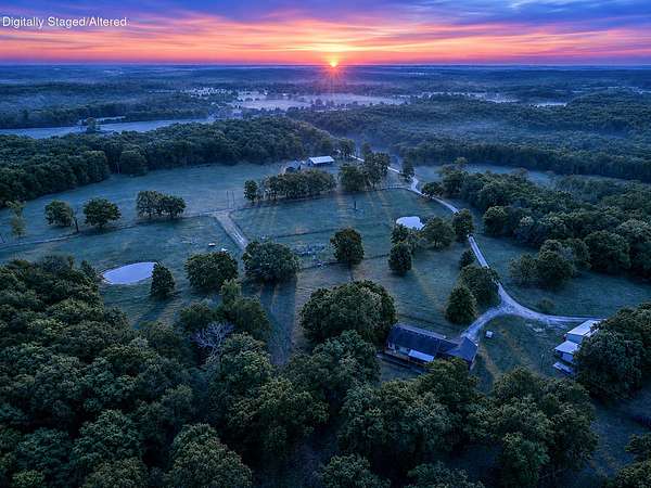 286 Acres of Land with Home for Sale in Niangua, Missouri