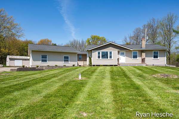 10 Acres of Recreational Land with Home for Sale in Lowell, Michigan