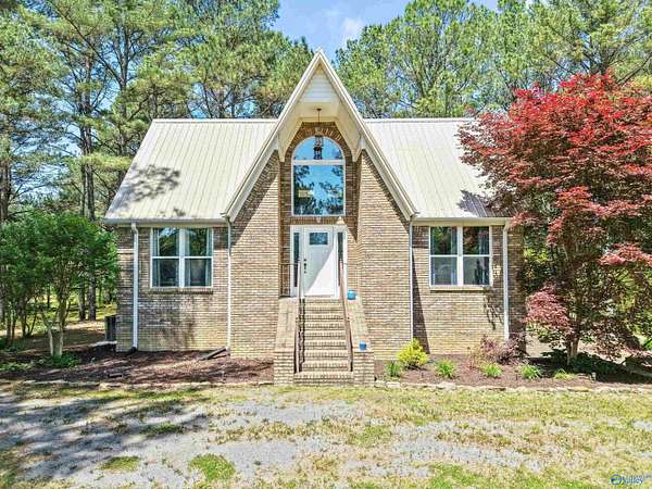 6.6 Acres of Land with Home for Sale in Collinsville, Alabama