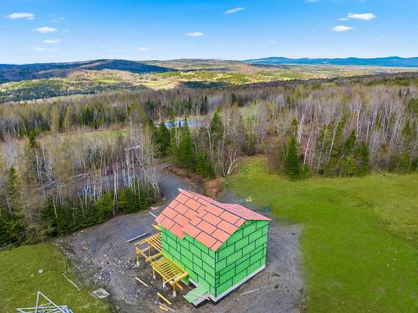 11.7 Acres of Recreational Land with Home for Sale in Colebrook, New Hampshire