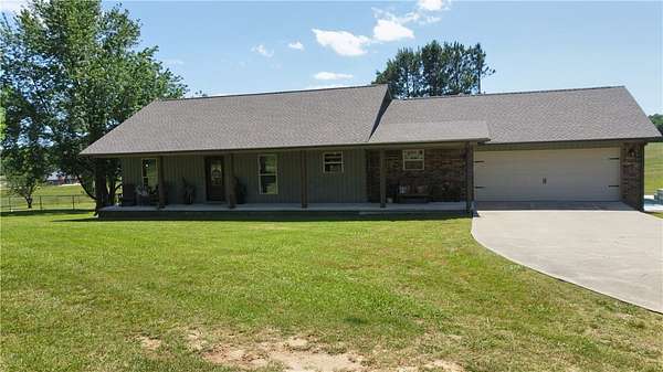 22.3 Acres of Land with Home for Sale in Clarksville, Arkansas