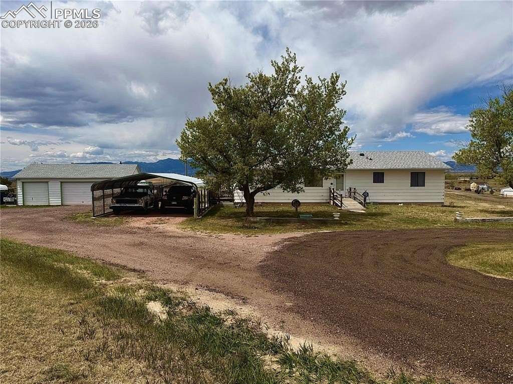 5.46 Acres of Land with Home for Sale in Peyton, Colorado