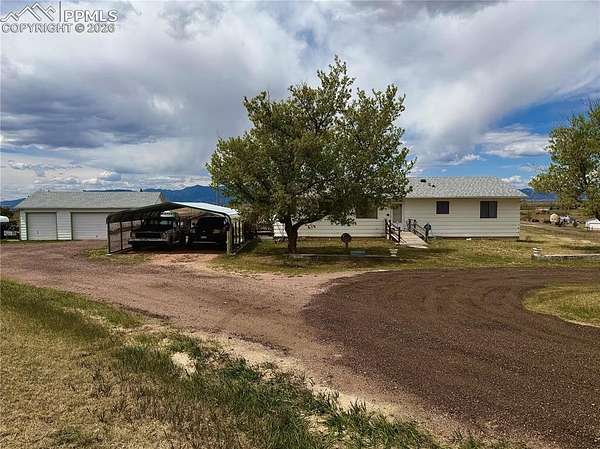 5.46 Acres of Land with Home for Sale in Peyton, Colorado