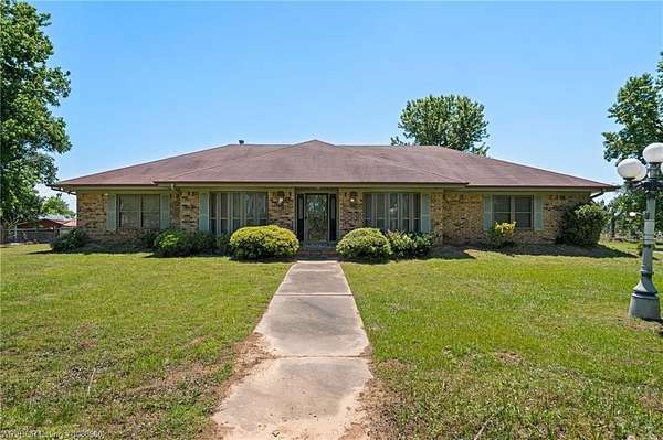 5.39 Acres of Land with Home for Auction in Muldrow, Oklahoma