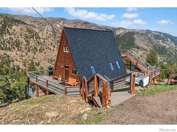 3.34 Acres of Land with Home for Sale in Glen Haven, Colorado