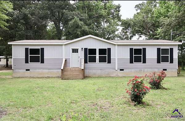 5 Acres of Land with Home for Sale in Jeffersonville, Georgia