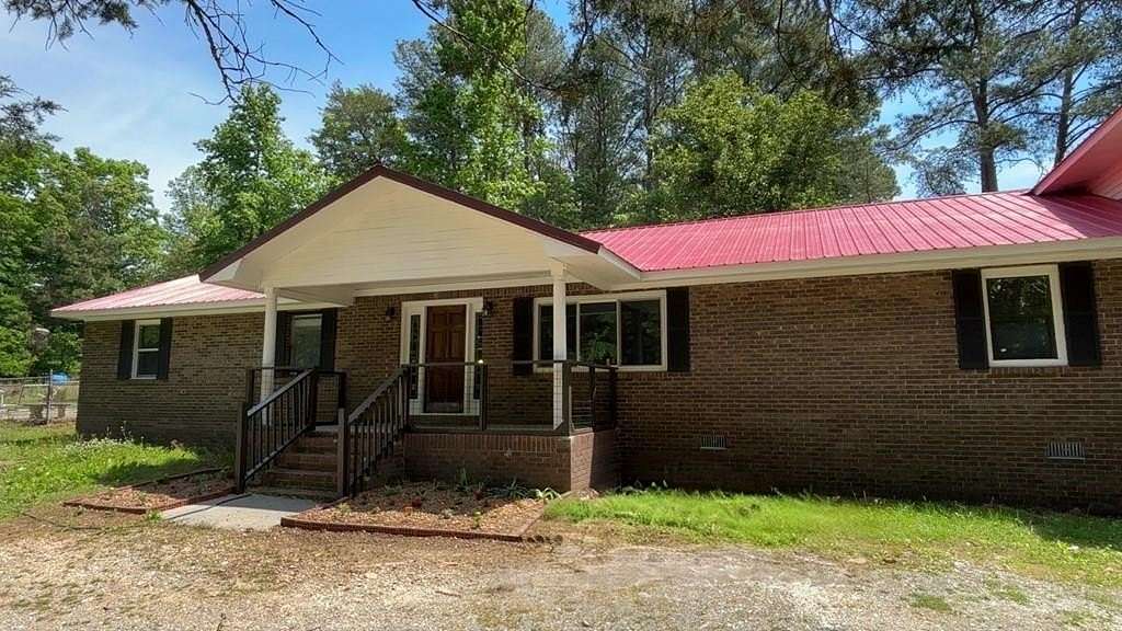 1.85 Acres of Land with Home for Sale in Dalton, Georgia