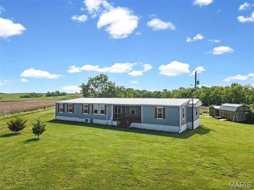 5 Acres of Land with Home for Sale in Knob Noster, Missouri
