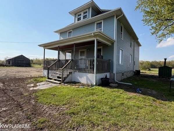 13.2 Acres of Land with Home for Sale in Cottrellville Township, Michigan
