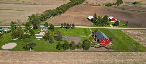 5.89 Acres of Land with Home for Sale in Leaf River, Illinois