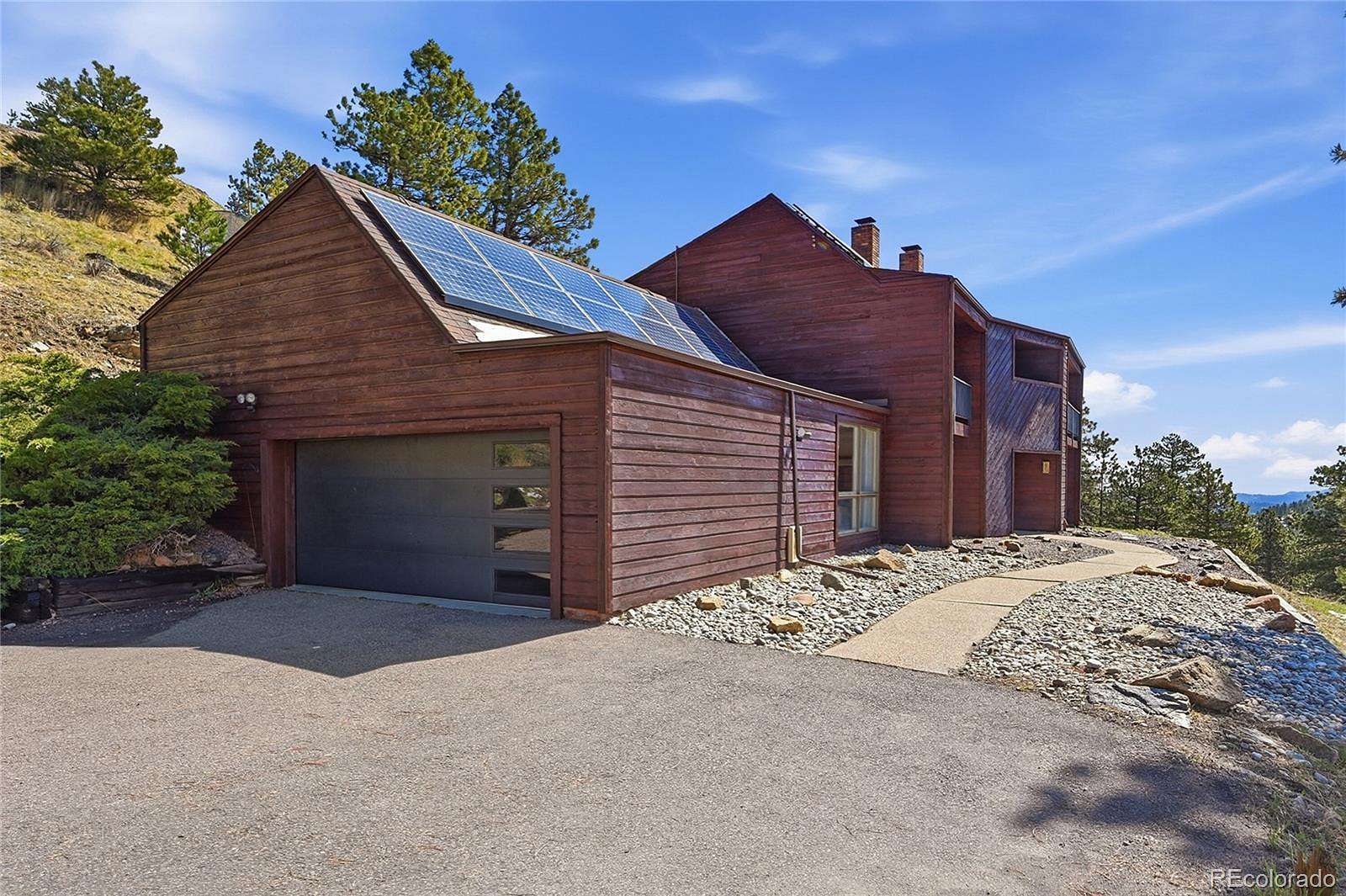 3.25 Acres of Land with Home for Sale in Evergreen, Colorado