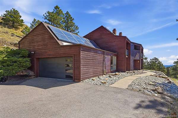 3.25 Acres of Land with Home for Sale in Evergreen, Colorado