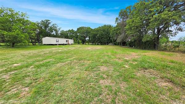 2.12 Acres of Land with Home for Sale in Scurry, Texas