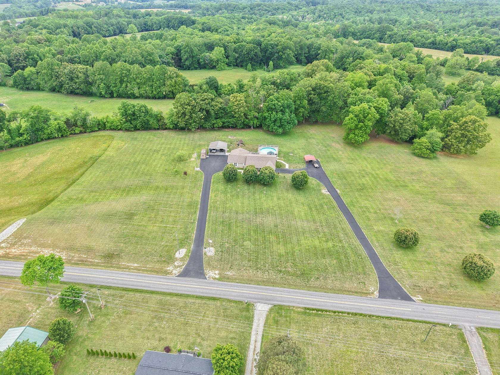 9.6 Acres of Land with Home for Sale in Russell Springs, Kentucky