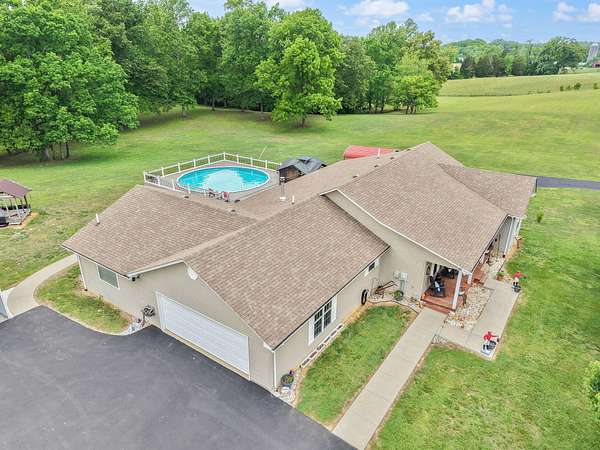 9.6 Acres of Land with Home for Sale in Russell Springs, Kentucky