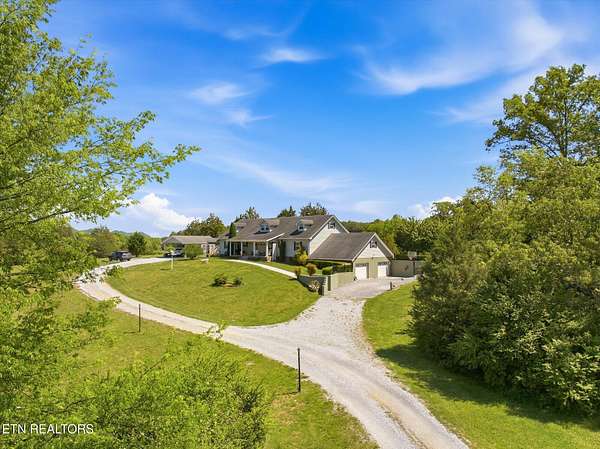 10.6 Acres of Land with Home for Sale in Tellico Plains, Tennessee