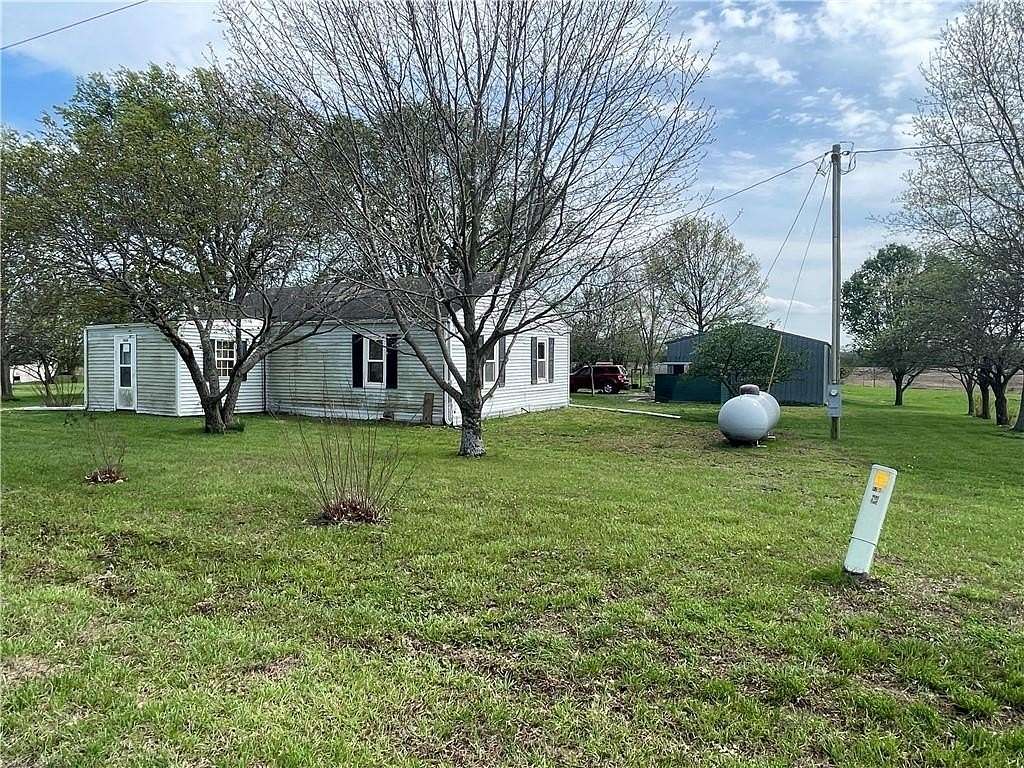 5 Acres of Land with Home for Sale in Holden, Missouri