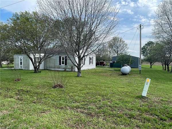 5 Acres of Land with Home for Sale in Holden, Missouri