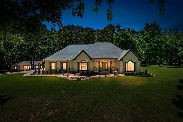 5 Acres of Land with Home for Sale in Eads, Tennessee