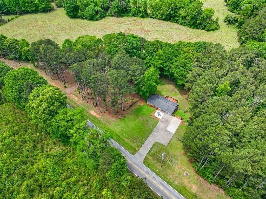 1.5 Acres of Land with Home for Sale in McDonough, Georgia