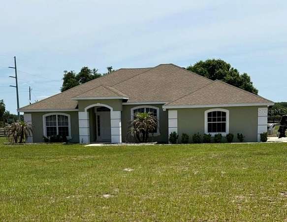 4.6 Acres of Land with Home for Sale in Umatilla, Florida