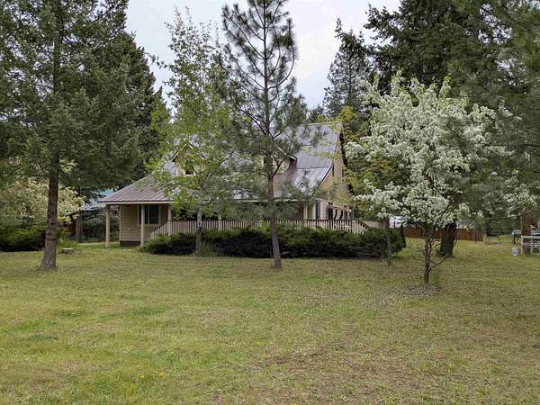 2.5 Acres of Land with Home for Sale in Loon Lake, Washington