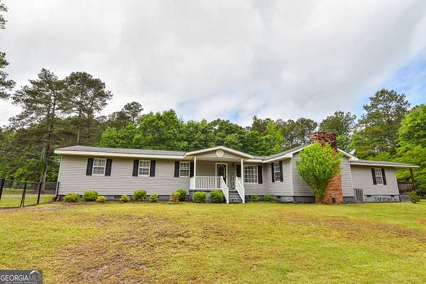 7.38 Acres of Land with Home for Sale in Barnesville, Georgia