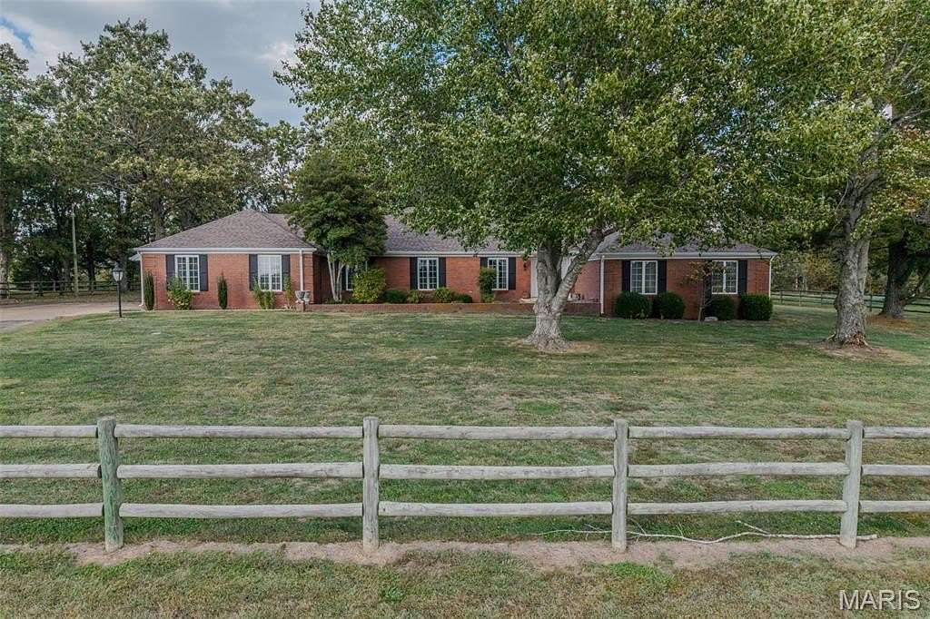 28 Acres of Land with Home for Sale in Lebanon, Missouri