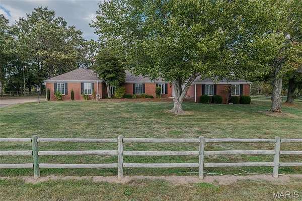 28 Acres of Land with Home for Sale in Lebanon, Missouri