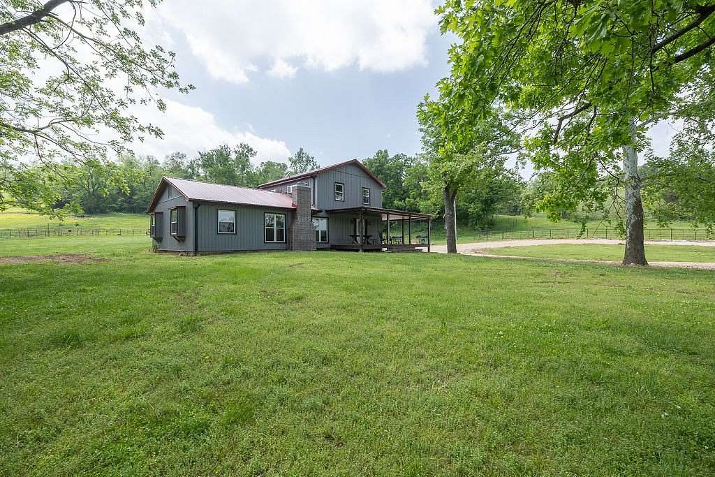 397 Acres of Agricultural Land with Home for Sale in Noel, Missouri