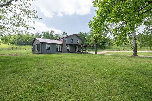 397 Acres of Agricultural Land with Home for Sale in Noel, Missouri