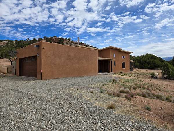 13.2 Acres of Land with Home for Sale in Santa Fe, New Mexico