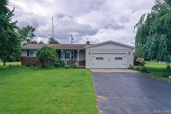 2 Acres of Land with Home for Sale in Marathon Township, Michigan