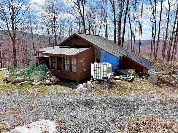 27.1 Acres of Recreational Land with Home for Sale in Barton, Vermont