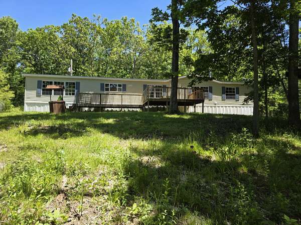 9.34 Acres of Land with Home for Sale in Seymour, Missouri