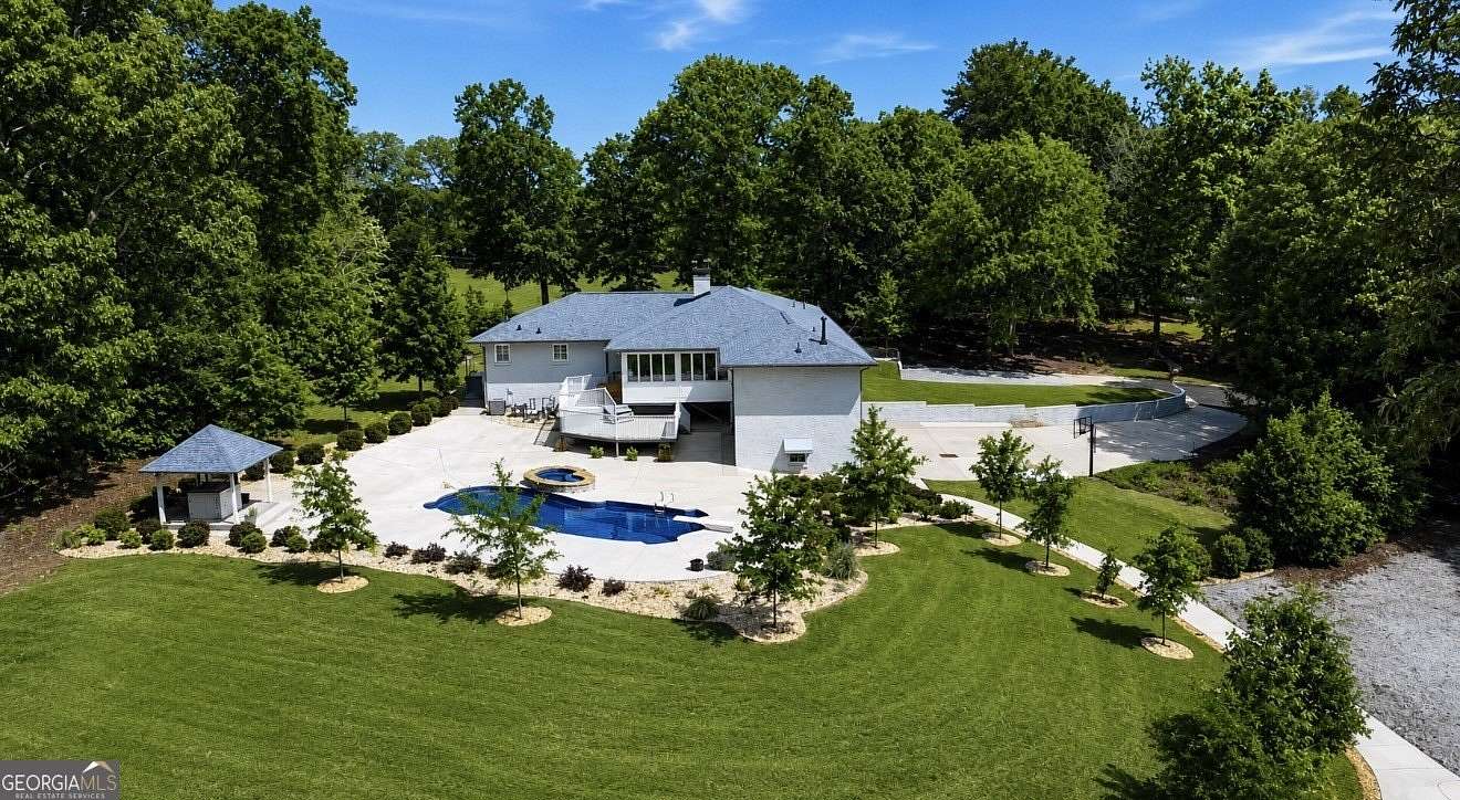 13.8 Acres of Recreational Land with Home for Sale in Powder Springs, Georgia