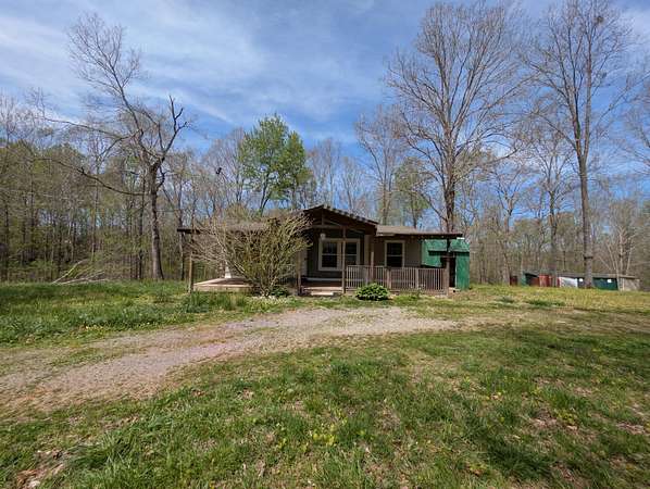 8.25 Acres of Land with Home for Sale in Bon Aqua, Tennessee