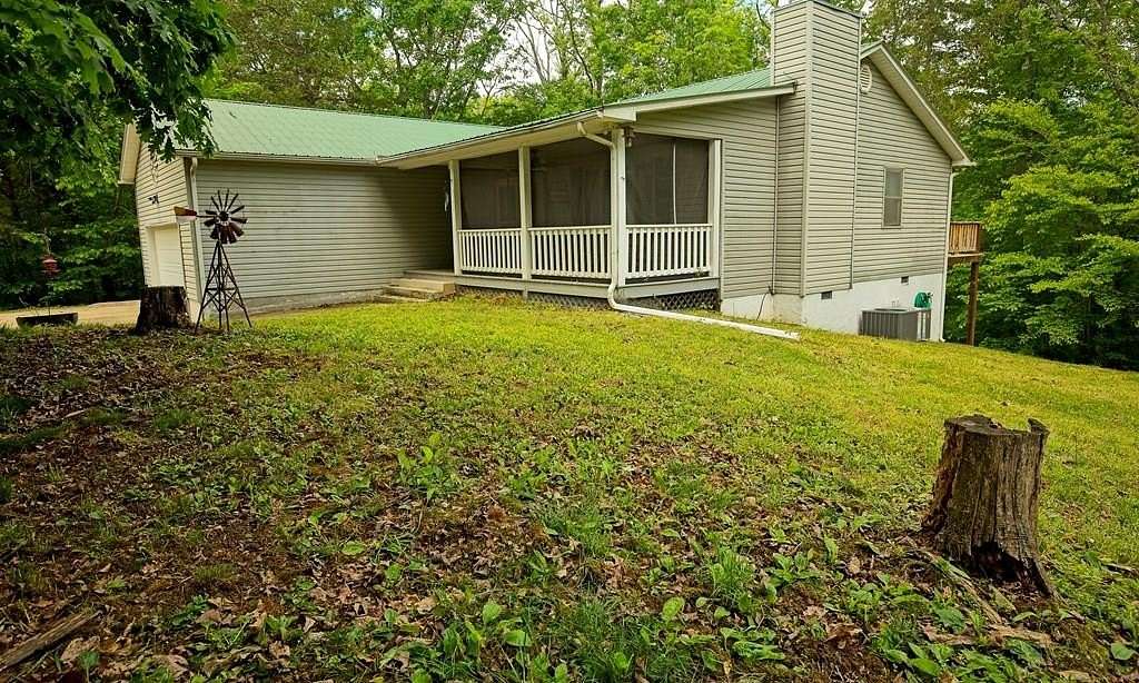 6.48 Acres of Land with Home for Sale in Wilder, Tennessee