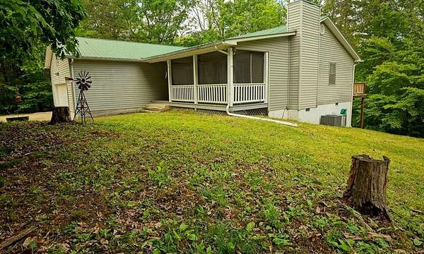 6.48 Acres of Land with Home for Sale in Wilder, Tennessee