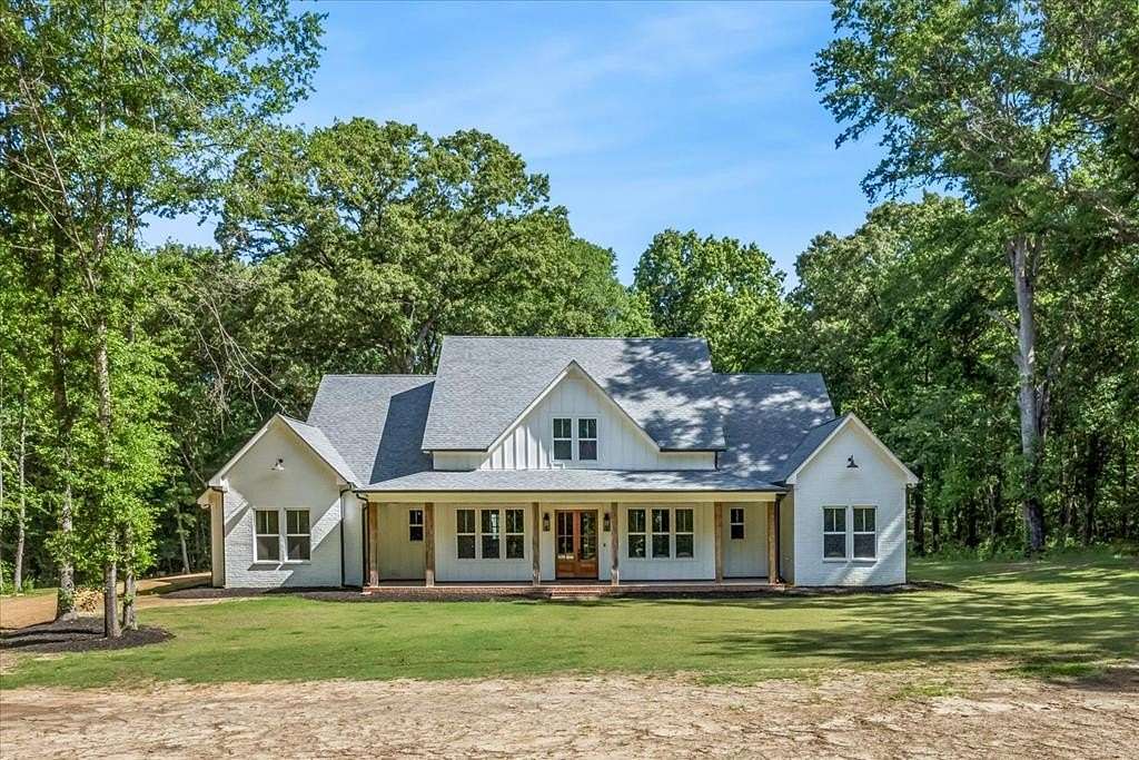 21.8 Acres of Recreational Land with Home for Sale in Como, Mississippi