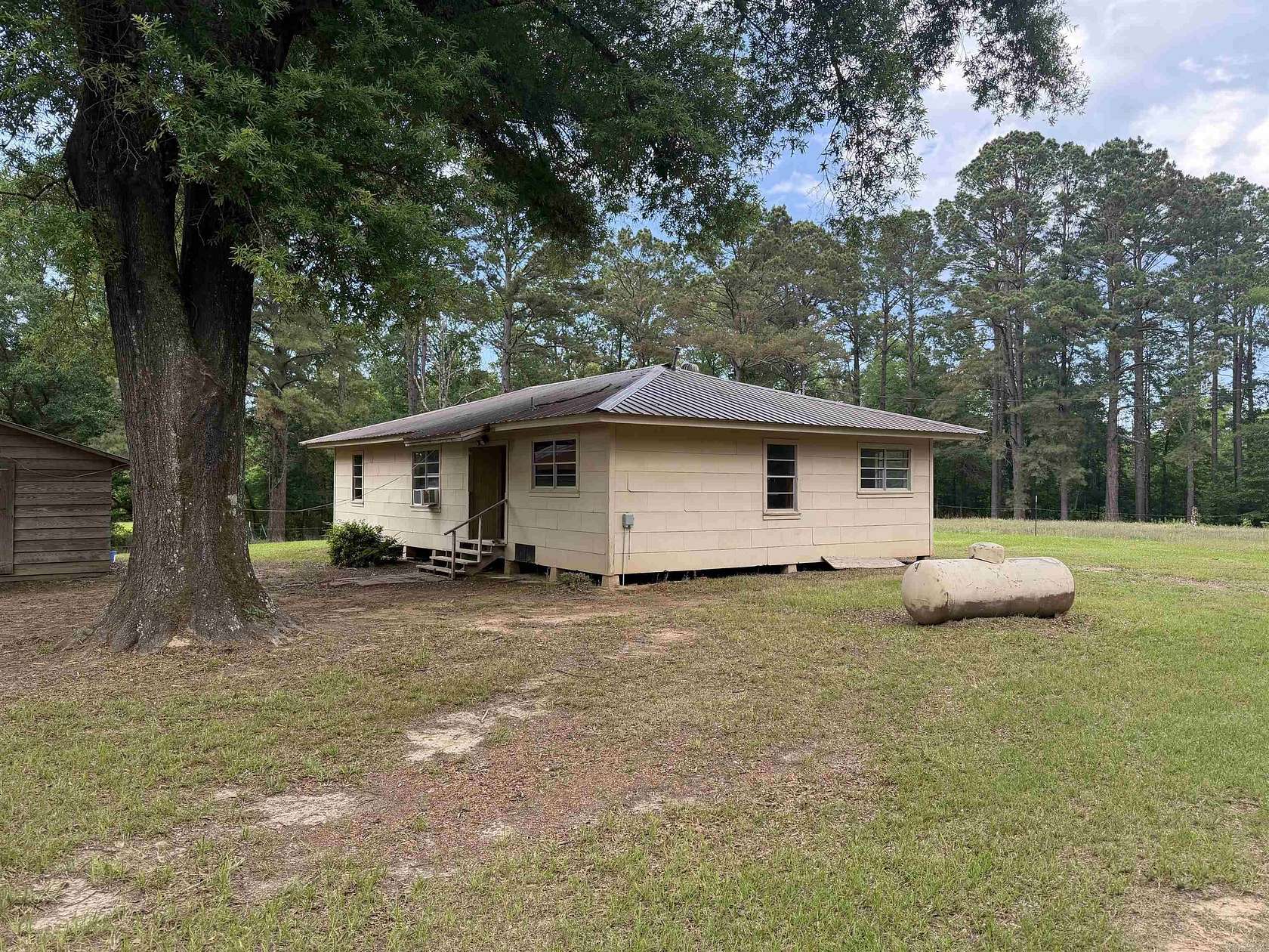 8.25 Acres of Land with Home for Sale in Hermitage, Arkansas