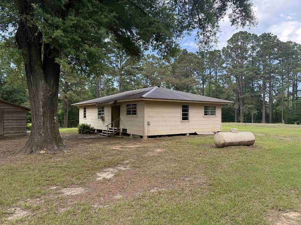 8.25 Acres of Land with Home for Sale in Hermitage, Arkansas