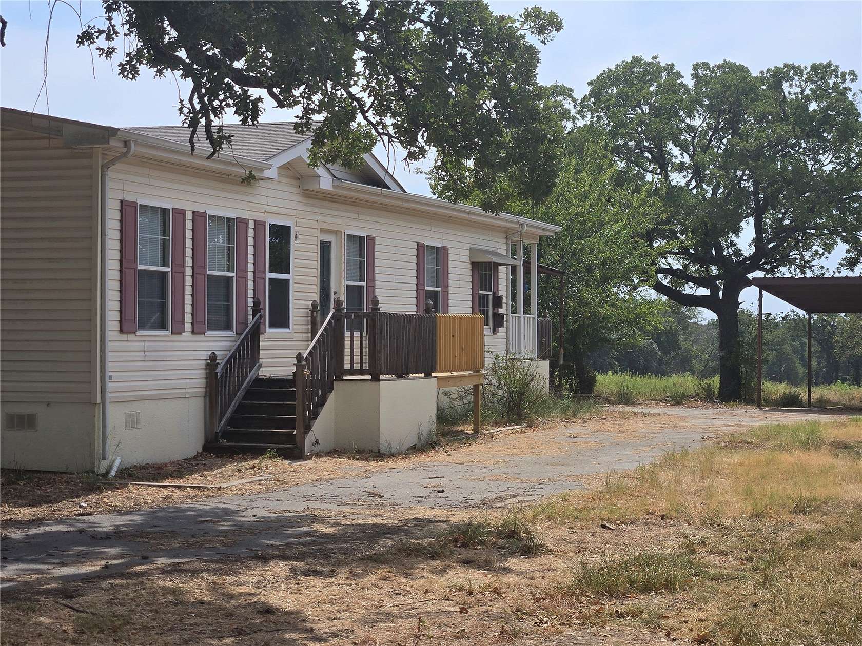 10 Acres of Land with Home for Sale in Springtown, Texas
