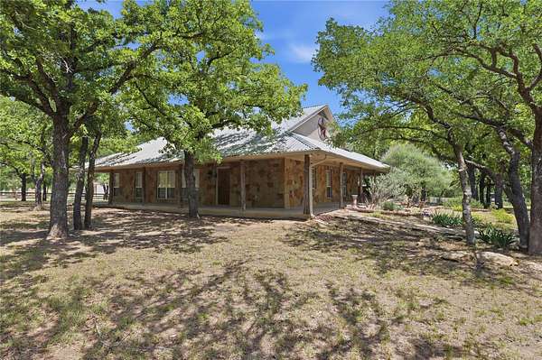 2.35 Acres of Land with Home for Sale in Brock, Texas