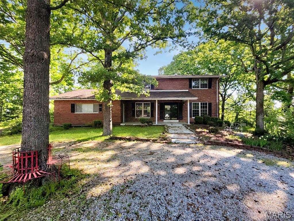 8.15 Acres of Land with Home for Sale in Arnold, Missouri