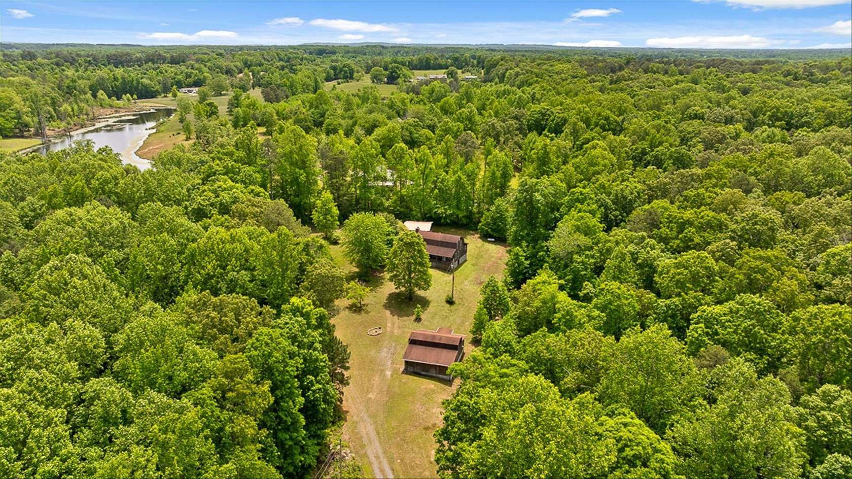 13.1 Acres of Land with Home for Sale in Pisgah, Alabama